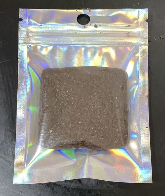 Cuadrante terapéutico de cacao empaquetado en bolsa de plástico